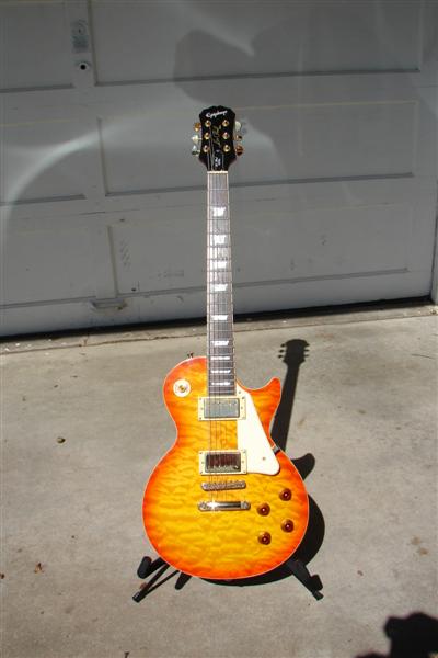 Epiphone Les Paul Ultra.  I love this guitar. Paid $245, the most expensive guitar I own.