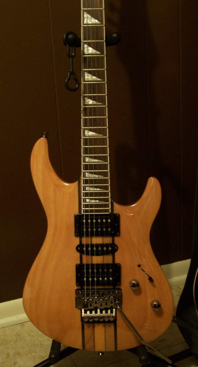 My Douglas. Mahogany, 5-piece neck through, LFR, and those cool sharkfin inlays. This one is pending a pickup change; some EMG passives that BC Don wa