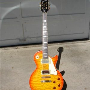 Epiphone Les Paul Ultra.  I love this guitar. Paid $245, the most expensive guitar I own.