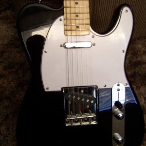 The Tele in it's current stock form. The plan is to put a P90 in the neck position, eventually.