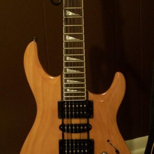 My Douglas. Mahogany, 5-piece neck through, LFR, and those cool sharkfin inlays. This one is pending a pickup change; some EMG passives that BC Don wa